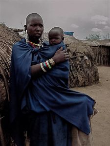 A Maasai woman and her child in a village in Tanzania.