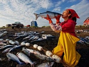 Woman kissing salmon