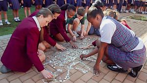Carter and Olivia visiting the Trinity House School in South Africa